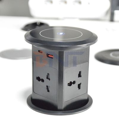 Nuevo ascensor neumático enchufe emergente EE.UU. Reino Unido Universal Cuatro montaje de superficie enchufe de escritorio superior con 15W de carga inalámbrica enchufe emergente