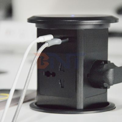 Nuevo ascensor neumático enchufe emergente EE.UU. Reino Unido Universal Cuatro montaje de superficie enchufe de escritorio superior con 15W de carga inalámbrica enchufe emergente